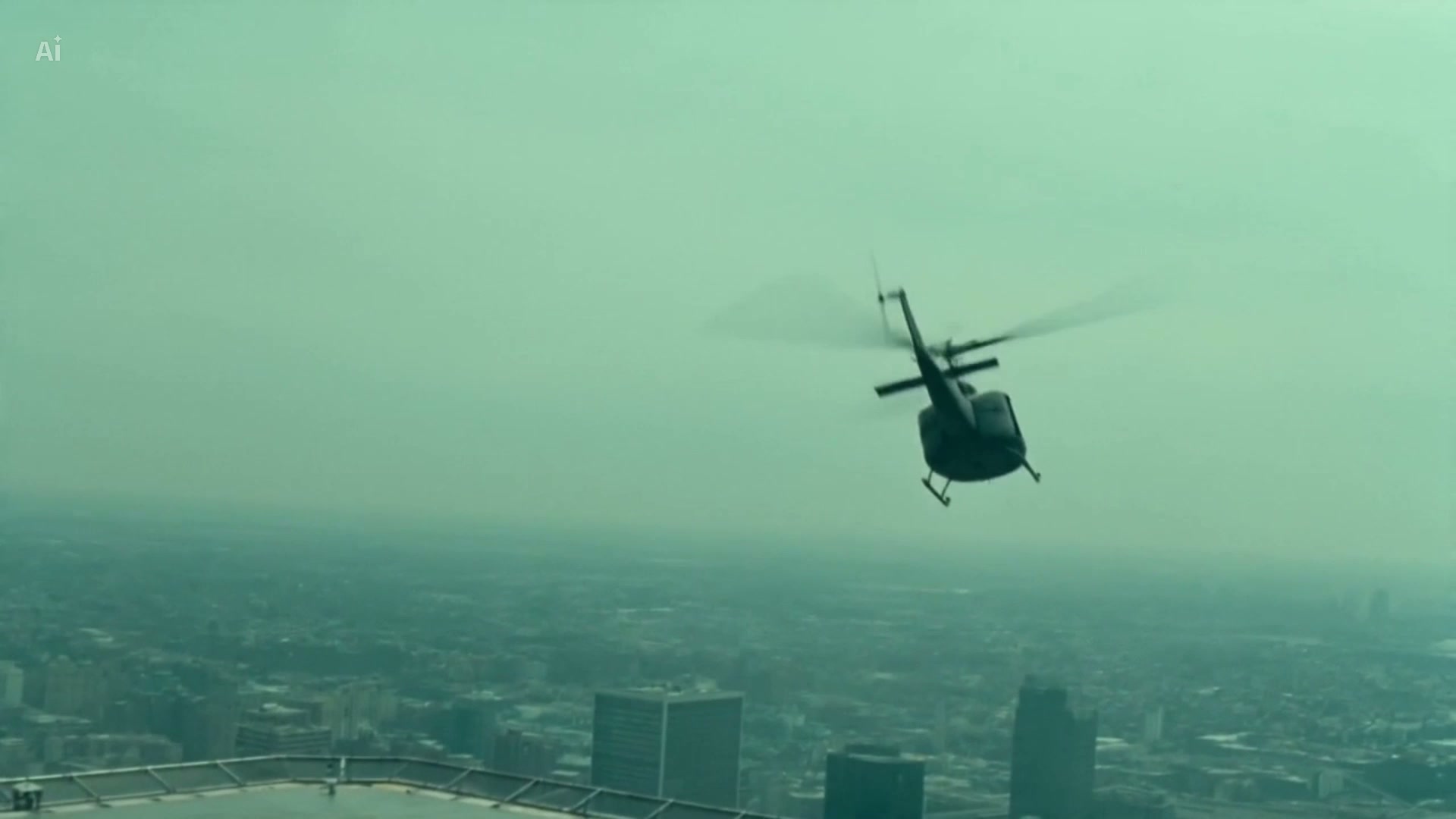 The helicopter lifting off and flying away over the city skyline
